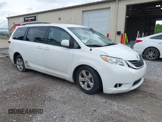 2011 Toyota Sienna LE AAS with VIN 5TDKK3DC6BS091557, listed as a IAAI auction lot 42170157 with 398,019 mi miles and . Bid and sale history available at carsss.com. Image 1.
