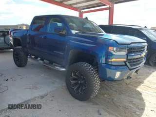 2018 Chevrolet Silverado 1500 LT with VIN 3GCUKREC0JG366590, listed as a IAAI auction lot 42045634 with 92,989 mi miles. Bid and sale history available at carsss.com. Image 1.