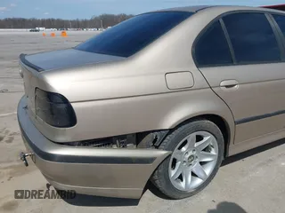 2000 BMW 5 Series 528i with VIN WBADM6348YGV00883, listed as a IAAI auction lot 41898075 with 175,137 mi miles and . Bid and sale history available at DreamBid. Image 6.