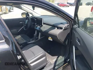 2025 Toyota Corolla Cross XLE with VIN 7MUDAABG4SV132327, listed as a IAAI auction lot 42500170 with 1,011 mi miles and . Bid and sale history available at DreamBid. Image 5.