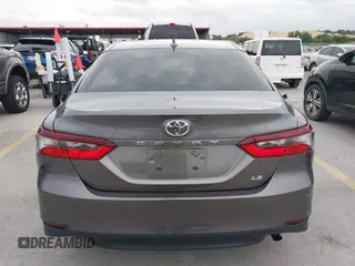 2023 Toyota Camry LE z VIN 4T1R11AK1PU169839, wystawiony jako IAAI lot #42140135 z przebiegiem 10 808 mil mil oraz . Historia ofert i sprzedaży dostępna na DreamBid. Obrazek 16.