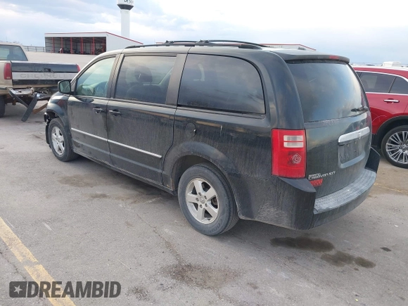 2008 Dodge Grand Caravan SXT with VIN 2D8HN54P48R827298, listed as a IAAI auction lot 41972302 with 199,903 mi miles and . Bid and sale history available at DreamBid. Image 3.