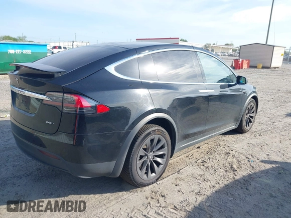 2017 Tesla Model X 90D z VIN 5YJXCAE29HF078571, wystawiony jako IAAI lot #42050041 z przebiegiem 216 874 mil mil oraz . Historia ofert i sprzedaży dostępna na DreamBid. Obrazek 4.