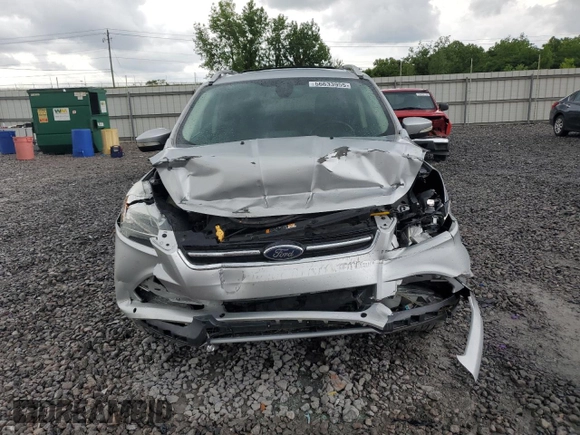 2013 Ford Escape Titanium with VIN 1FMCU9J94DUB00695, listed as a Copart auction lot 56633955 with 129,011 mi miles and Salvage title. Bid and sale history available at DreamBid. Image 5.