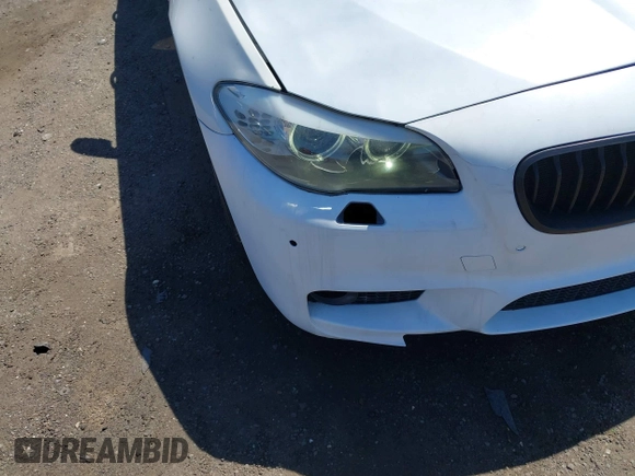 2013 BMW 5 Series 535i with VIN WBAFR7C54DC819983, listed as a IAAI auction lot 42141306 with 135,938 mi miles and . Bid and sale history available at carsss.com. Image 17.