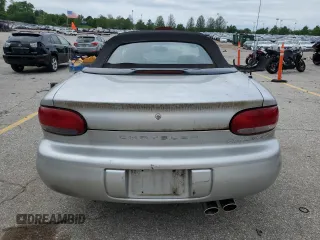 2000 Chrysler Sebring JXi z VIN 3C3EL55H7YT271942, wystawiony jako Copart lot #57423345 z przebiegiem 116 504 mil mil oraz Szkoda całkowita • Salvage title. Historia ofert i sprzedaży dostępna na DreamBid. Obrazek 6.