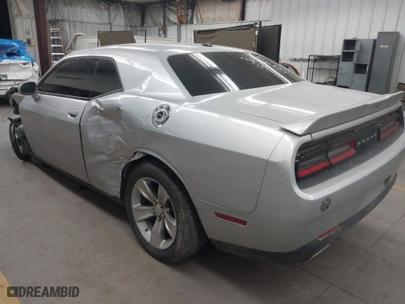 2021 Dodge Challenger SXT with VIN 2C3CDZAG8MH630713, listed as a IAAI auction lot 41825990 with 67,603 mi miles. Bid and sale history available at carsss.com. Image 3.