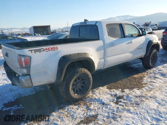 2021 Toyota Tacoma 4WD SR5 with VIN 3TMDZ5BN6MM105593, listed as a IAAI auction lot 41424096 with 39,215 mi miles. Bid and sale history available at carsss.com. Image 4.