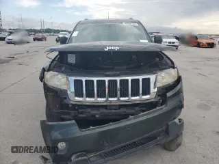 2011 Jeep Grand Cherokee Laredo z VIN 1J4RR4GG1BC520579, wystawiony jako Copart lot #60860794 z przebiegiem 196 271 mil mil oraz Szkoda całkowita • Salvage title. Historia ofert i sprzedaży dostępna na DreamBid. Obrazek 5.