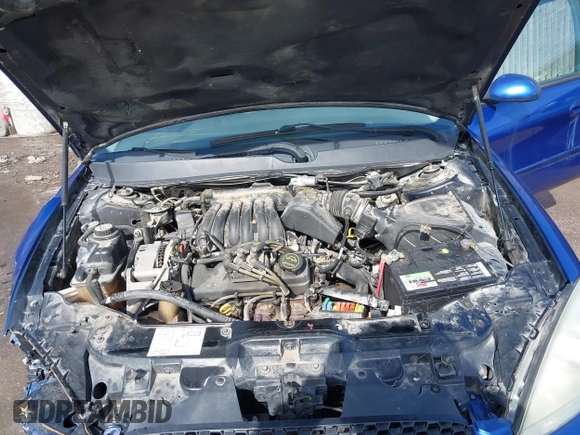 2003 Ford Taurus SE Standard with VIN 1FAFP53233G208763, listed as a IAAI auction lot 41661923 with 127,830 mi miles. Bid and sale history available at carsss.com. Image 10.