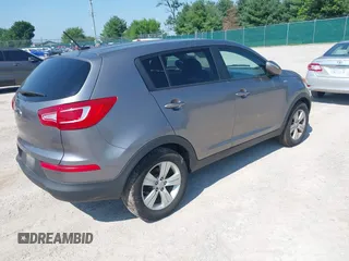 2012 Kia Sportage LX with VIN KNDPBCA28C7237079, listed as a IAAI auction lot 42663554 with 245,420 mi miles and . Bid and sale history available at DreamBid. Image 4.