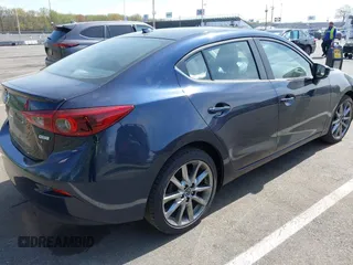 2018 Mazda 3 Grand Touring with VIN 3MZBN1W36JM213063, listed as a IAAI auction lot 42102460 with 49,180 mi miles and . Bid and sale history available at DreamBid. Image 4.