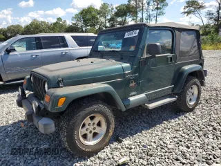 2001 Jeep Wrangler Sahara with VIN 1J4FA59S61P373670, listed as a Copart auction lot 74060614 with 176,111 mi miles and Clean Title. Bid and sale history available at carsss.com. Image 1.