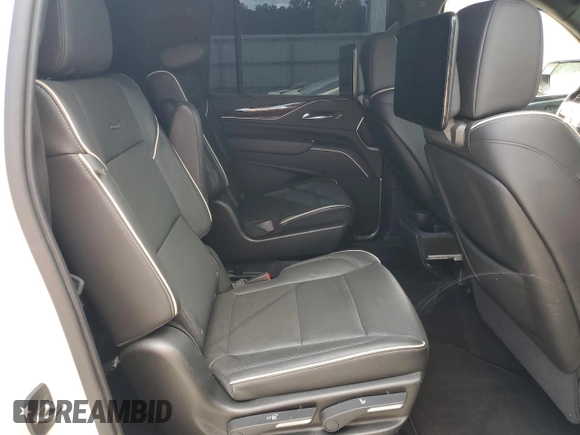 2021 Cadillac Escalade z VIN 1GYS3KKL5MR228333, wystawiony jako Copart lot #71914694 z przebiegiem Nie podano mil oraz Szkoda całkowita • Salvage title. Historia ofert i sprzedaży dostępna na DreamBid. Obrazek 11.