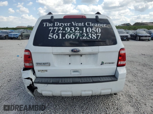 2011 Ford Escape Hybrid z VIN 1FMCU5K34BKB66370, wystawiony jako Copart lot #53090685 z przebiegiem 251 409 mil mil oraz Szkoda całkowita • Salvage title. Historia ofert i sprzedaży dostępna na DreamBid. Obrazek 6.