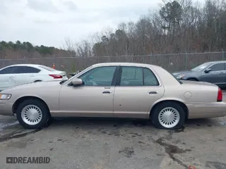 1998 Mercury Grand Marquis LS with VIN 2MEFM75W2WX695255, listed as a IAAI auction lot 41481865 with 177,365 mi miles. Bid and sale history available at carsss.com. Image 14.