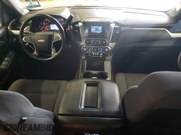 2015 Chevrolet Tahoe LS with VIN 1GNSCAKC9FR301715, listed as a Copart auction lot 64249005 with 107,240 mi miles and Clean title. Bid and sale history available at DreamBid. Image 8.
