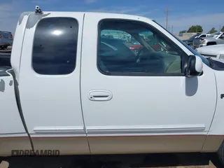 1999 Ford F-150 with VIN 1FTZX1720XKB31945, listed as a IAAI auction lot 42123984 with 187,766 mi miles and . Bid and sale history available at DreamBid. Image 13.