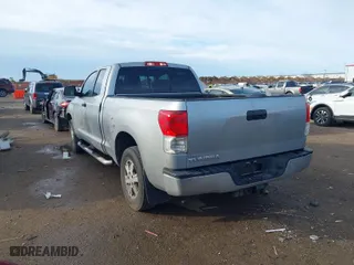 2012 Toyota Tundra 2WD Truck with VIN 5TFRM5F14CX037380, listed as a IAAI auction lot 41683381 with 218,413 mi miles. Bid and sale history available at carsss.com. Image 3.