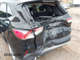 2020 Ford Escape S with VIN 1FMCU0F65LUA21111, listed as a IAAI auction lot 42371480 with 60,988 mi miles and . Bid and sale history available at DreamBid. Image 6.