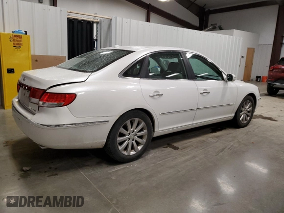 2009 Hyundai Azera Limited z VIN KMHFC46F29A371099, wystawiony jako Copart lot #57395815 z przebiegiem 69 313 mil mil oraz Szkoda całkowita • Salvage title. Historia ofert i sprzedaży dostępna na DreamBid. Obrazek 3.