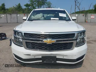 2017 Chevrolet Tahoe LT z VIN 1GNSKBKC2HR330422, wystawiony jako IAAI lot #42419205 z przebiegiem 136 444 mil mil oraz . Historia ofert i sprzedaży dostępna na DreamBid. Obrazek 12.