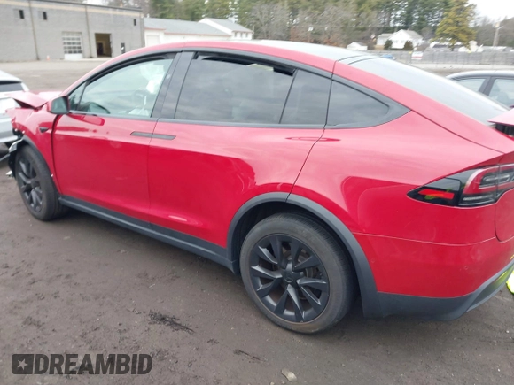 2022 Tesla Model X with VIN 7SAXCBE57NF354843, listed as a IAAI auction lot 41027188 with Not Provided miles and . Bid and sale history available at DreamBid. Image 14.