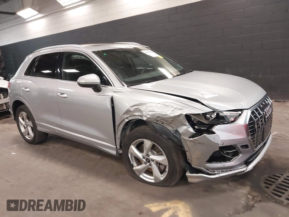 2021 Audi Q3 Premium with VIN WA1AUCF34M1078805, listed as a IAAI auction lot 42026360 with 38,473 mi miles and . Bid and sale history available at DreamBid. Image 1.