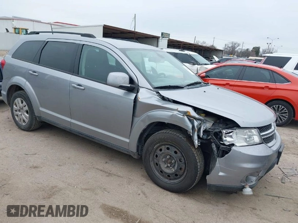 2019 Dodge Journey SE with VIN 3C4PDCBB0KT816103, listed as a IAAI auction lot 41640272 with 118,310 mi miles and . Bid and sale history available at DreamBid. Image 1.