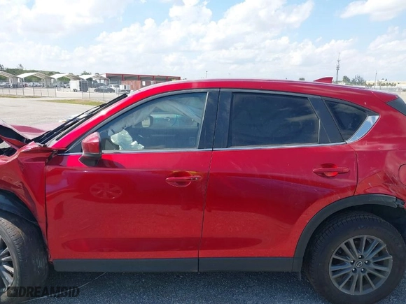2021 Mazda CX-5 Touring with VIN JM3KFACMXM0462381, listed as a IAAI auction lot 40993844 with 53,528 mi miles. Bid and sale history available at carsss.com. Image 13.
