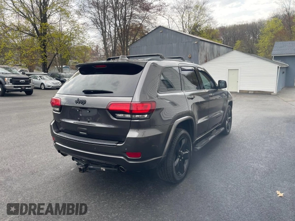 2015 Jeep Grand Cherokee Laredo with VIN 1C4RJFAGXFC233877, listed as a Copart auction lot 54858775 with 231,505 mi miles and Clean Title. Bid and sale history available at carsss.com. Image 4.