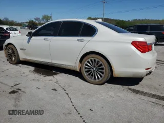 2011 BMW 7 Series 740i with VIN WBAKA4C50BC612878, listed as a Copart auction lot 52035635 with 192,248 mi miles and Salvage Title. Bid and sale history available at carsss.com. Image 2.