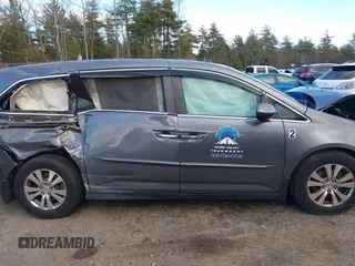 2014 Honda Odyssey EX-L with VIN 5FNRL5H67EB073640, listed as a IAAI auction lot 41115124 with 99,841 mi miles and . Bid and sale history available at carsss.com. Image 13.