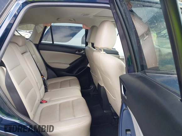 2015 Mazda CX-5 Grand Touring with VIN JM3KE4DY7F0478823, listed as a IAAI auction lot 40731626 with 82,884 mi miles. Bid and sale history available at carsss.com. Image 8.