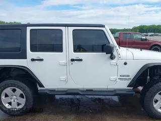 2013 Jeep Wrangler Unlimited Sport with VIN 1C4BJWDG4DL599151, listed as a IAAI auction lot 42212831 with 143,865 mi miles and . Bid and sale history available at DreamBid. Image 13.