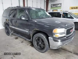2005 GMC Yukon SLT with VIN 1GKEK13TX5J250573, listed as a IAAI auction lot 41629644 with 2,711,230 mi miles. Bid and sale history available at carsss.com. Image 1.