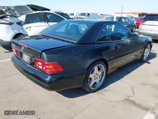 2002 Mercedes-Benz SL-Class with VIN WDBFA68F72F202884, listed as a IAAI auction lot 41473512 with 184,456 mi miles. Bid and sale history available at carsss.com. Image 4.