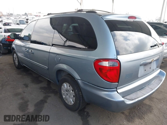 2006 Chrysler Town & Country LX with VIN 1A4GP44R46B609965, listed as a IAAI auction lot 42093438 with 333,689 mi miles and . Bid and sale history available at DreamBid. Image 3.