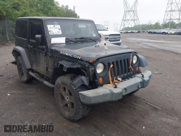 2007 Jeep Wrangler Rubicon with VIN 1J4GA64117L149666, listed as a IAAI auction lot 42252464 with 100,791 mi miles and . Bid and sale history available at DreamBid. Image 6.