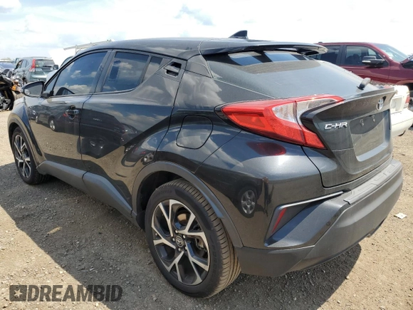 2018 Toyota C-HR XLE with VIN NMTKHMBX0JR014576, listed as a Copart auction lot 63263215 with 95,649 mi miles and Clean title. Bid and sale history available at DreamBid. Image 2.