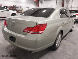 2005 Toyota Avalon XL with VIN 4T1BK36B65U023629, listed as a IAAI auction lot 41963531 with 255,044 mi miles. Bid and sale history available at carsss.com. Image 4.