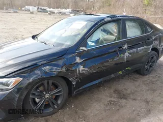 2023 Volkswagen Jetta SE z VIN 3VW7M7BU1PM039129, wystawiony jako IAAI lot #41905547 z przebiegiem 20 188 mil mil oraz . Historia ofert i sprzedaży dostępna na DreamBid. Obrazek 6.