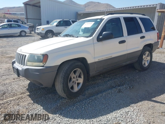 2004 Jeep Grand Cherokee Laredo with VIN 1J4GX48SX4C151160, listed as a IAAI auction lot 42765441 with 176,179 mi miles and . Bid and sale history available at DreamBid. Image 2.