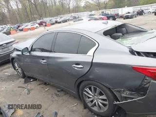 2014 Infiniti Q50 Premium z VIN JN1BV7AP8EM674625, wystawiony jako IAAI lot #41922173 z przebiegiem Nie podano mil oraz . Historia ofert i sprzedaży dostępna na DreamBid. Obrazek 14.