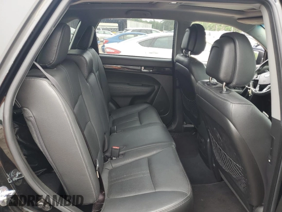 2011 Kia Sorento EX z VIN 5XYKU4A28BG025617, wystawiony jako Copart lot #54141405 z przebiegiem 151 066 mil mil oraz Szkoda całkowita • Salvage title. Historia ofert i sprzedaży dostępna na DreamBid. Obrazek 10.