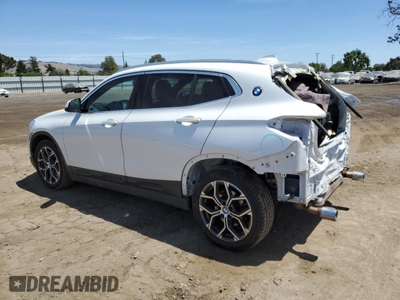 2023 BMW X2 sDrive28i z VIN WBXYH9C06P5V65784, wystawiony jako Copart lot #57108985 z przebiegiem 37 113 mil mil oraz Szkoda całkowita • Salvage title. Historia ofert i sprzedaży dostępna na DreamBid. Obrazek 2.