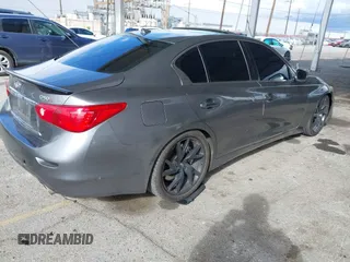 2015 Infiniti Q50 Premium with VIN JN1BV7AP1FM330183, listed as a IAAI auction lot 41788224 with 139,818 mi miles. Bid and sale history available at carsss.com. Image 4.