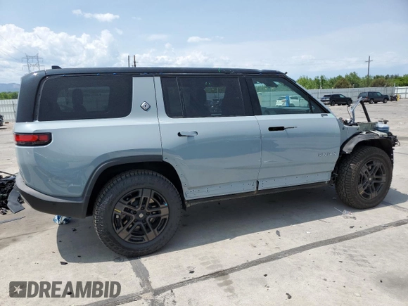 2025 Rivian R1S Adventure z VIN 7PDSGBBA2SN051004, wystawiony jako Copart lot #58999005 z przebiegiem 786 mil mil oraz Szkoda całkowita • Salvage title. Historia ofert i sprzedaży dostępna na DreamBid. Obrazek 3.