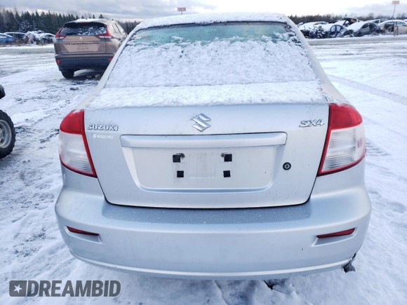 2010 Suzuki SX4 LE with VIN JS2YC5A25A6300970, listed as a Copart auction lot 81596084 with 142,083 mi miles and Salvage Title. Bid and sale history available at carsss.com. Image 6.
