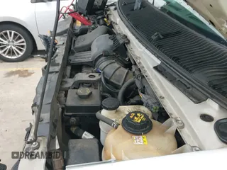 2009 Ford Econoline Cargo Commercial z VIN 1FTNE14W29DA56023, wystawiony jako IAAI lot #42362663 z przebiegiem 211 326 mil mil oraz . Historia ofert i sprzedaży dostępna na DreamBid. Obrazek 21.